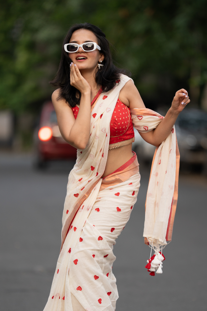 SAREEN Cream Mal Cotton Saree with Red Heart Butti & Copper Border