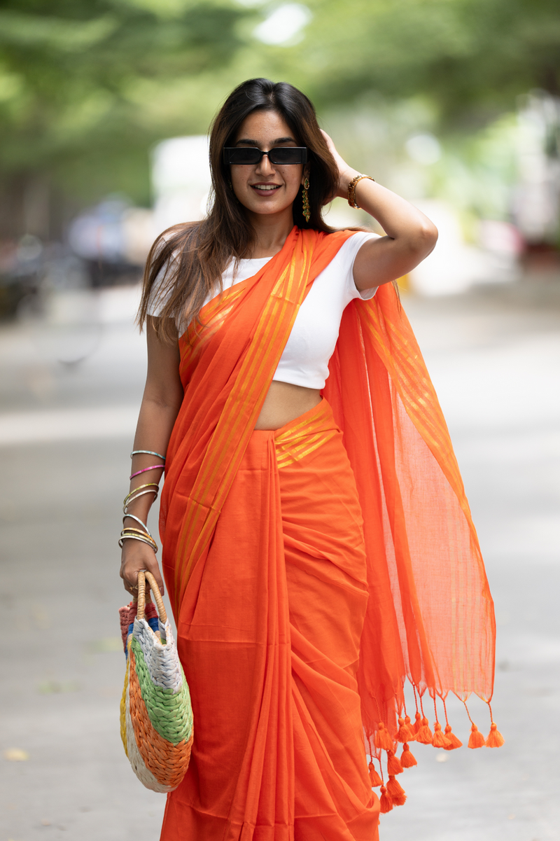 SAREEN Bright Orange Mal Cotton Saree with Golden Stripes – Summer Festive Wear