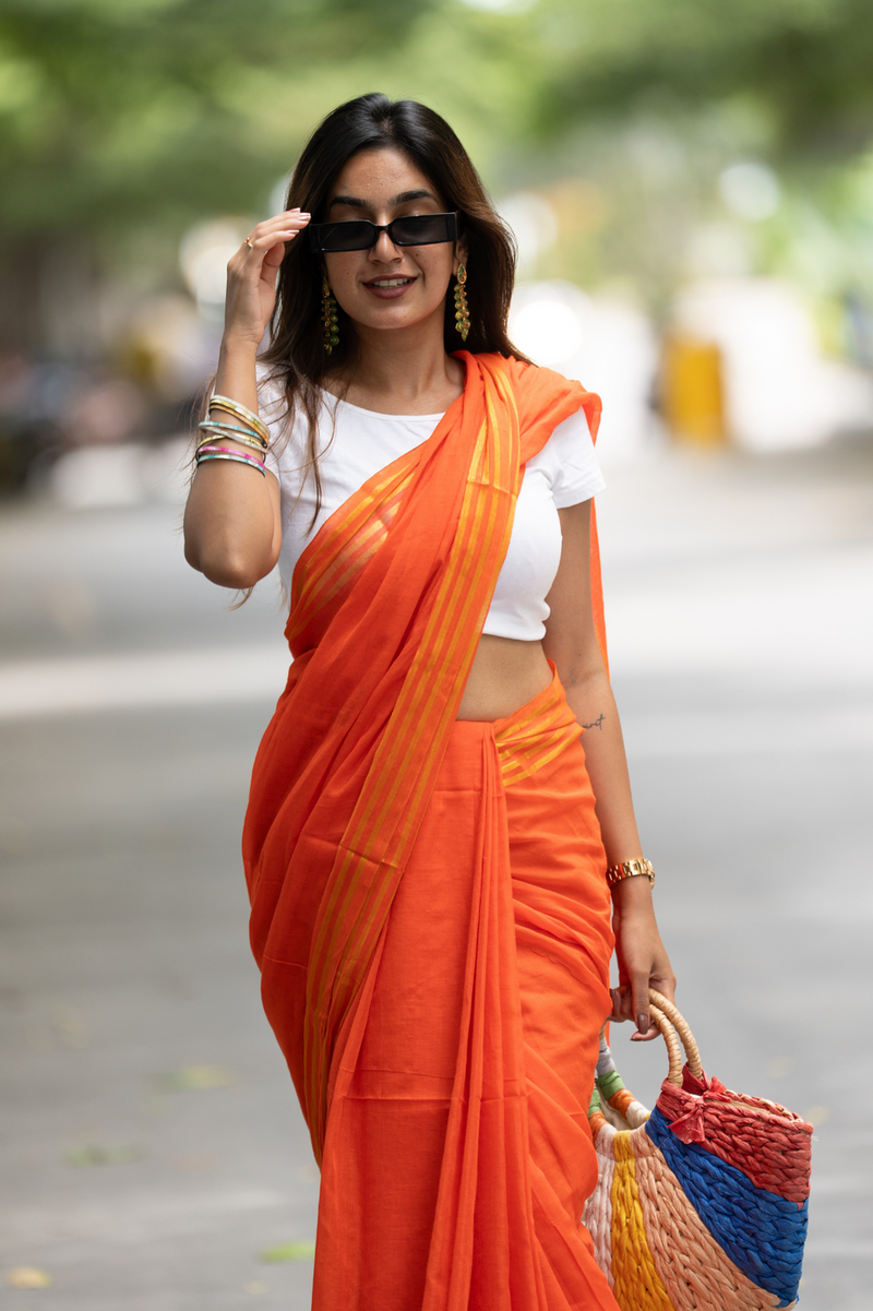 SAREEN Bright Orange Mal Cotton Saree with Golden Stripes – Summer Festive Wear