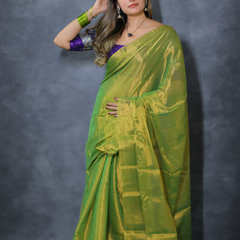SAREEN Parrot Green Raga Cotton Tissue Saree with Radiant Golden Finish