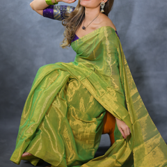 SAREEN Parrot Green Raga Cotton Tissue Saree with Radiant Golden Finish