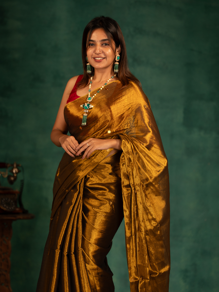 SAREEN Deep Antique Gold Gini Raga Cotton Tissue Saree with Elegant Tassels