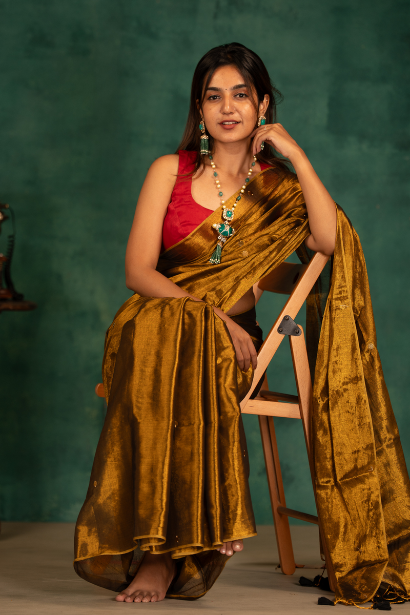 SAREEN Deep Antique Gold Gini Raga Cotton Tissue Saree with Elegant Tassels