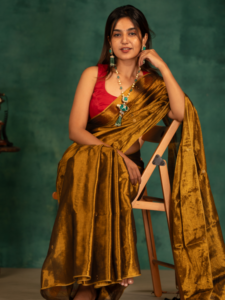 SAREEN Deep Antique Gold Gini Raga Cotton Tissue Saree with Elegant Tassels