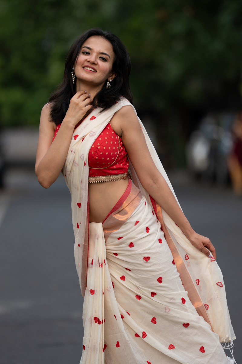 SAREEN Cream Mal Cotton Saree with Red Heart Butti & Copper Border