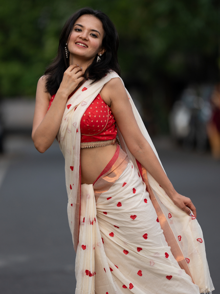 SAREEN Cream Mal Cotton Saree with Red Heart Butti & Copper Border