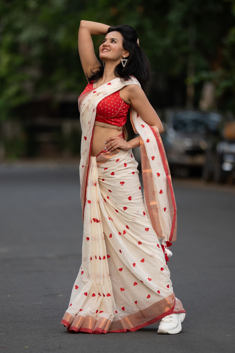 SAREEN Cream Mal Cotton Saree with Red Heart Butti & Copper Border