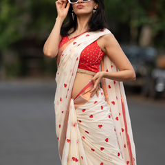 SAREEN Cream Mal Cotton Saree with Red Heart Butti & Copper Border