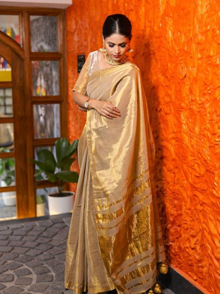 SAREEN Golden Beige Raga Tissue Saree with Subtle Zari Stripes & Tassel Pallu