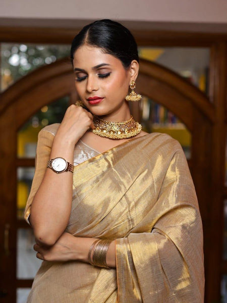 SAREEN Golden Beige Raga Tissue Saree with Subtle Zari Stripes & Tassel Pallu