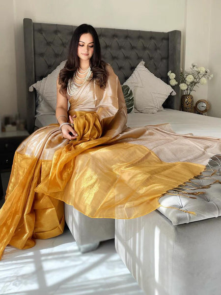 SAREEN Champagne Gold & Mustard Bicolor Raga Tissue Saree – Royal Glow Edit